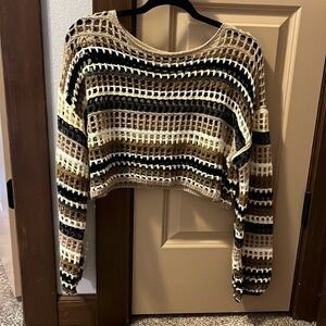 crochet cropped sweater. It’s super soft and light weight